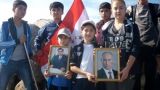 Портреты Путина и Рахмона водрузили на вершину таджикской горы