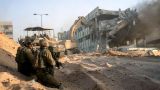 Израильская армия продвигается в Газе с боевыми потерями