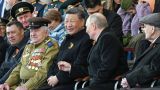 Стали известны имена ветеранов, сидевших на параде рядом с Владимиром Путиным